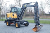 Minituur van Volvo EW60E | DEMO | 30 KM/H | ROTOTILT + GRIPPER | BUCKET