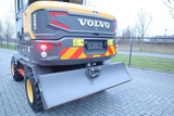 Minituur van Volvo EW60E | DEMO | 30 KM/H | ROTOTILT + GRIPPER | BUCKET