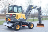 Minituur van Volvo EW60E | DEMO | 30 KM/H | ROTOTILT + GRIPPER | BUCKET