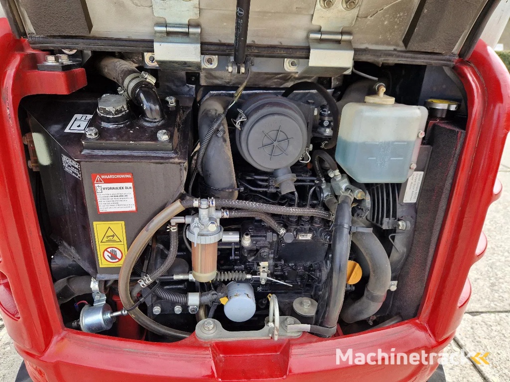 Takeuchi TB216 met 2089 uur