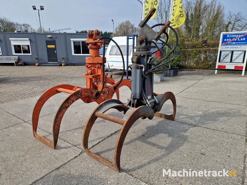 O&K en Atlas hydraulische bomenklemmen