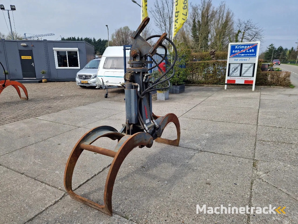 O&K en Atlas hydraulische bomenklemmen