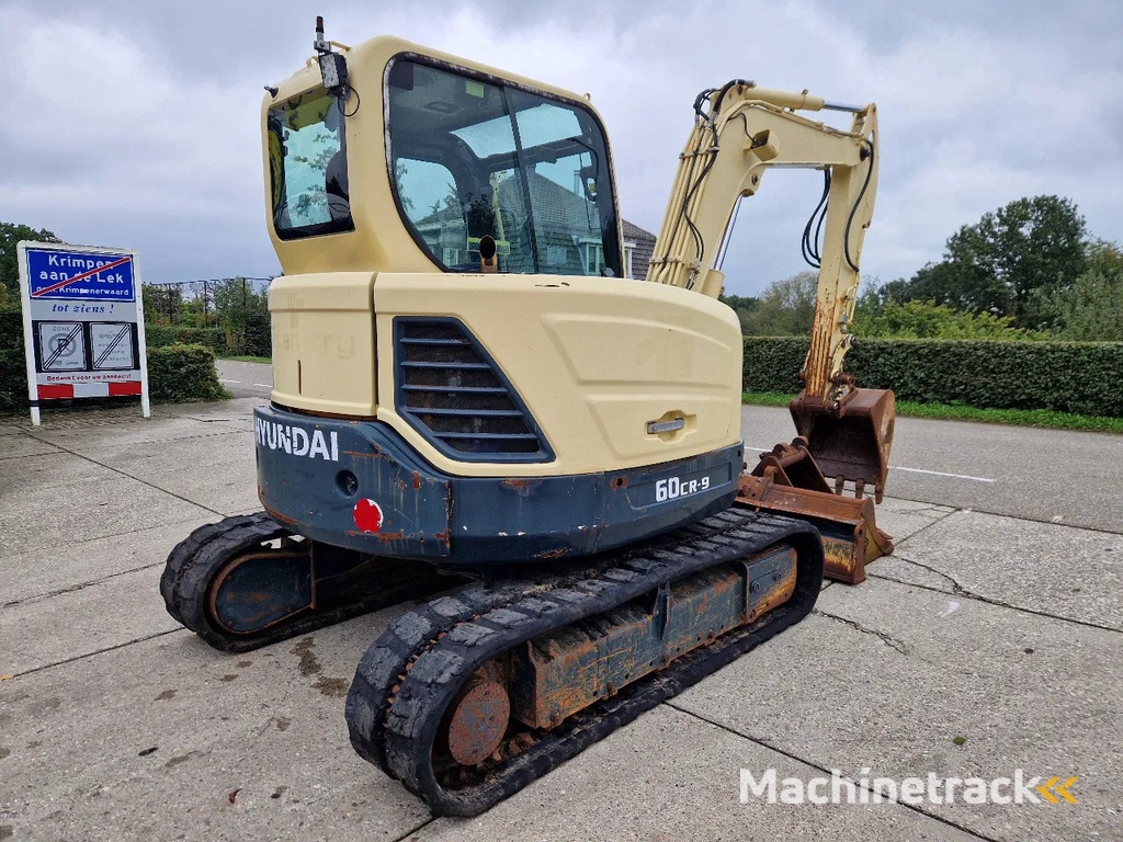 Hyundai Robex CR60-9 met airco en 3 bakken