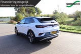 Minituur van Volkswagen ID.4 First 77 kWh deels leder trekhaak adaptive cruise met lane asist carplay en android auto sfeerverlichting