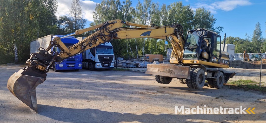 Caterpillar M 315 Rototilt