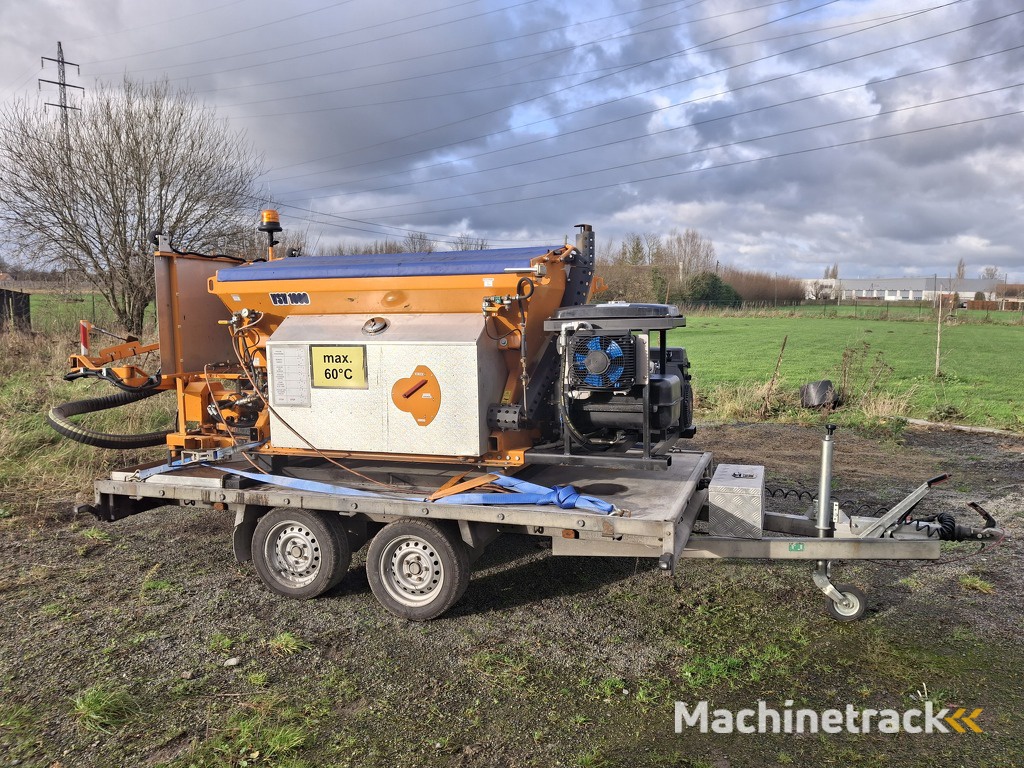 Spraypatcher / enrobe projete