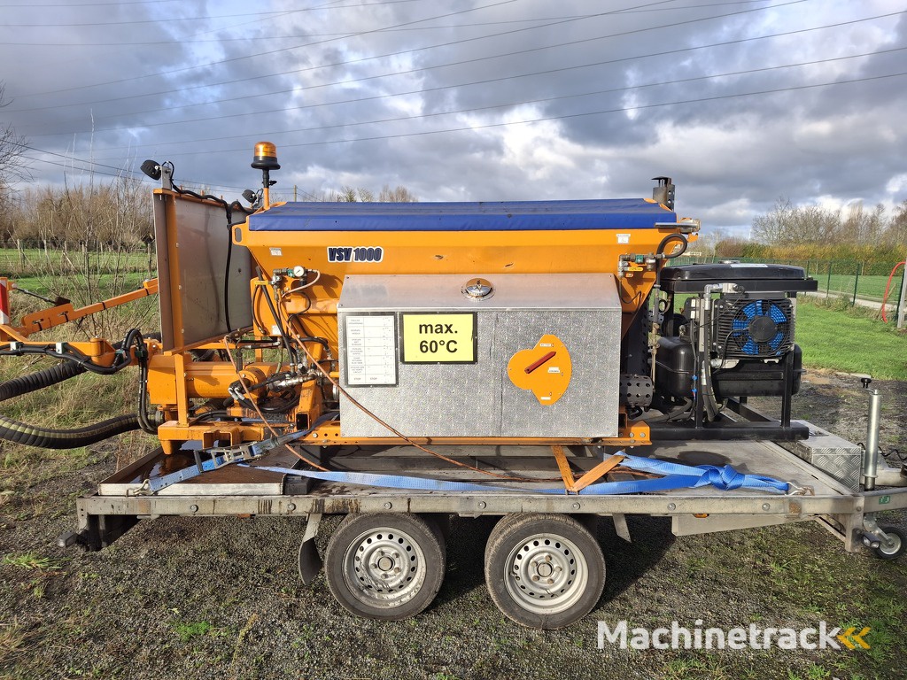 Spraypatcher / enrobe projete