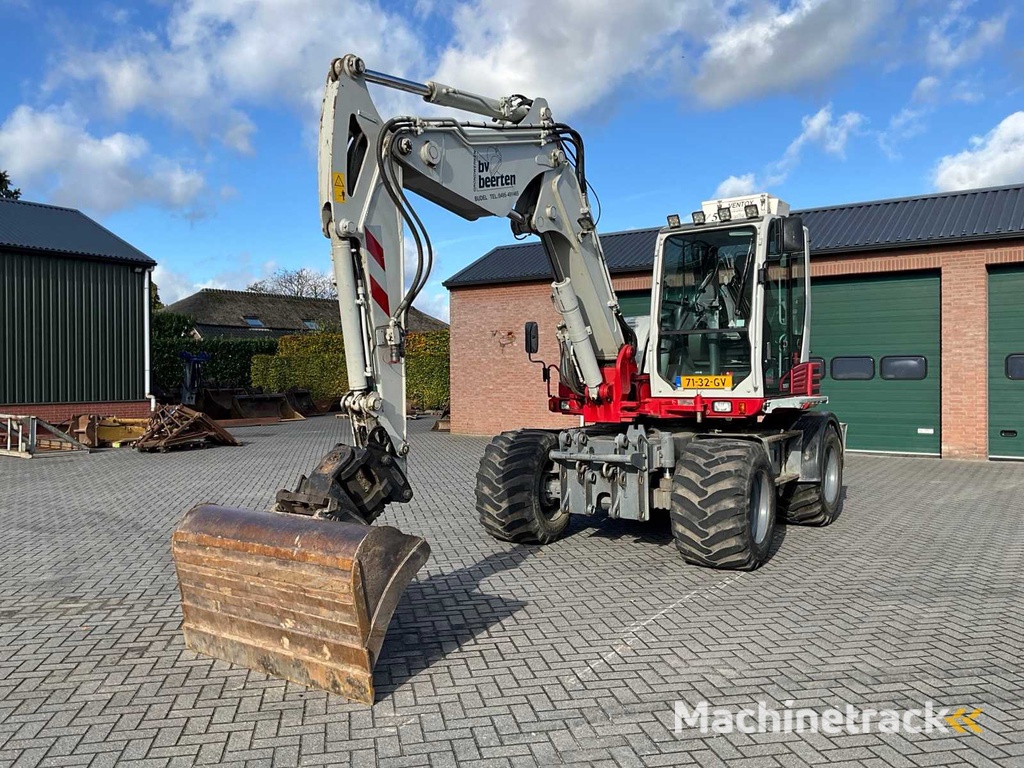 2015 Takeuchi TB295W Mobilbagger
