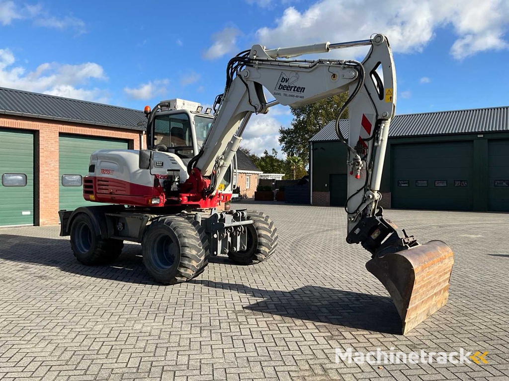 2015 Takeuchi TB295W Mobilbagger