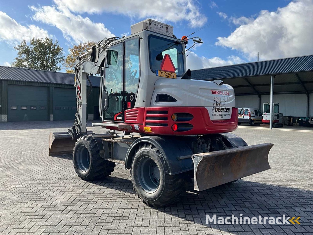 2015 Takeuchi TB295W Mobilbagger