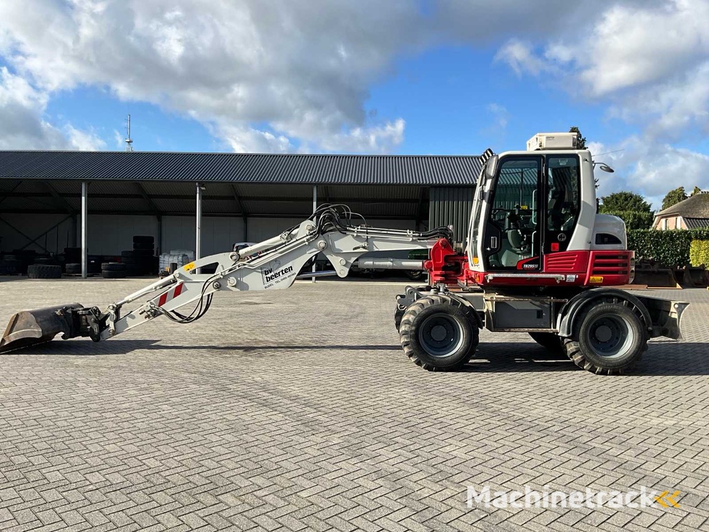 2015 Takeuchi TB295W Mobilbagger