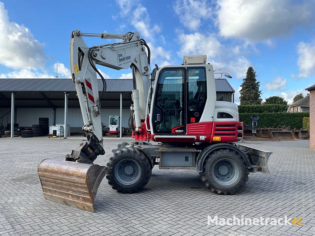 2015 Takeuchi TB295W Mobilbagger