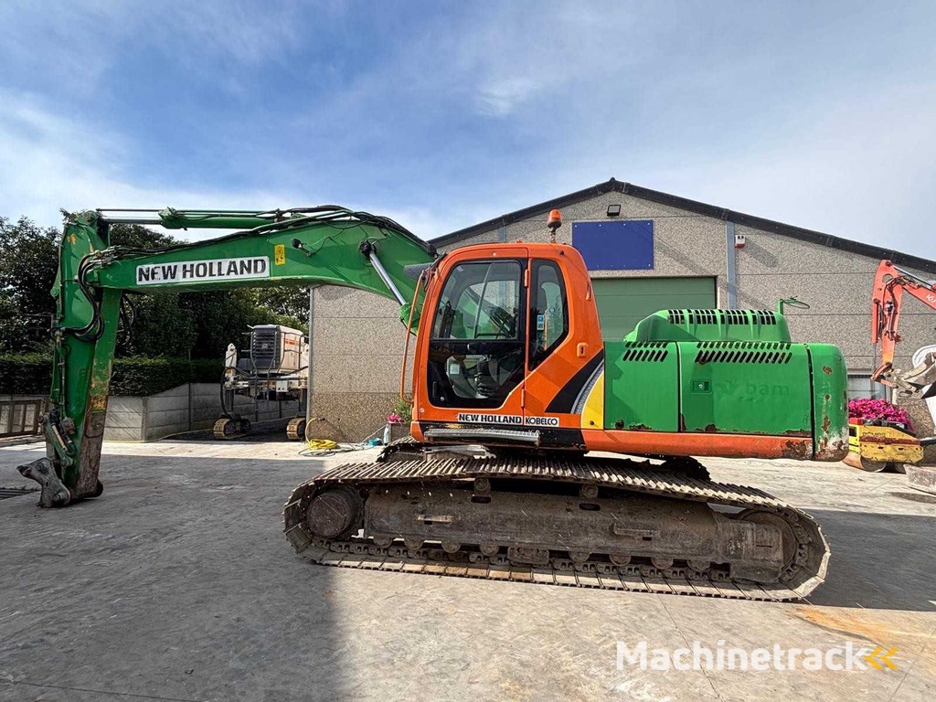 New Holland - 2008 - E265 - Rupsgraafmachine