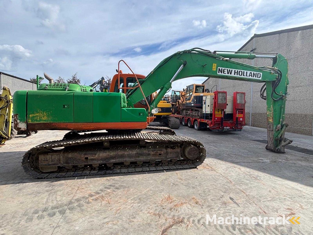 New Holland - 2008 - E265 - Rupsgraafmachine