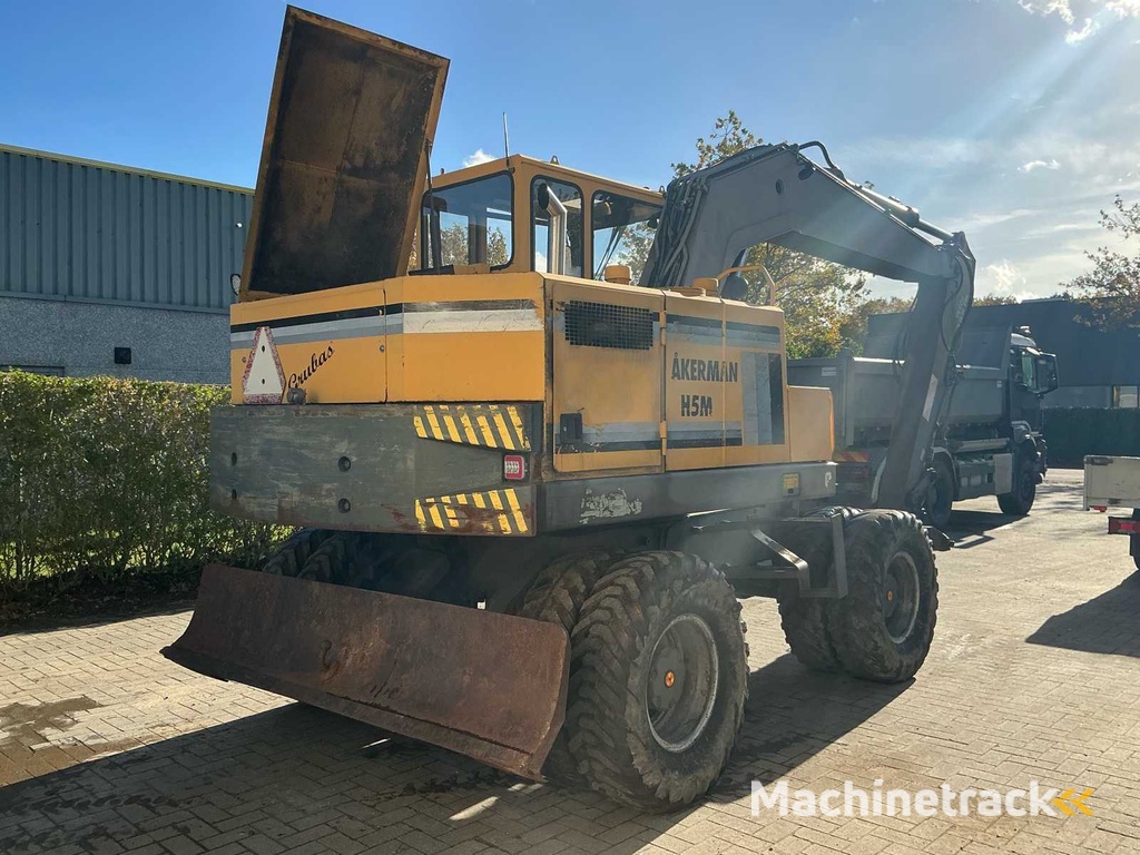 Akerman H5M Bandenkraan Banden graafmachine