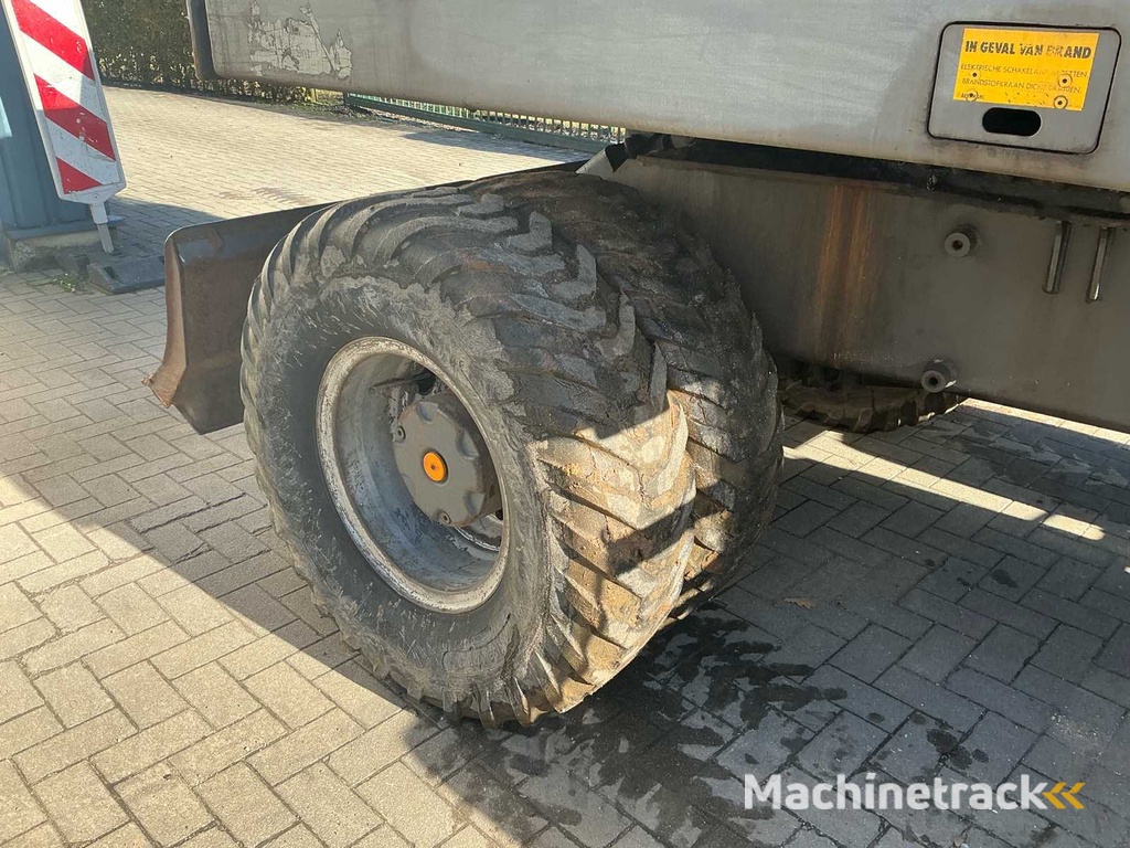 Akerman H5M Bandenkraan Banden graafmachine