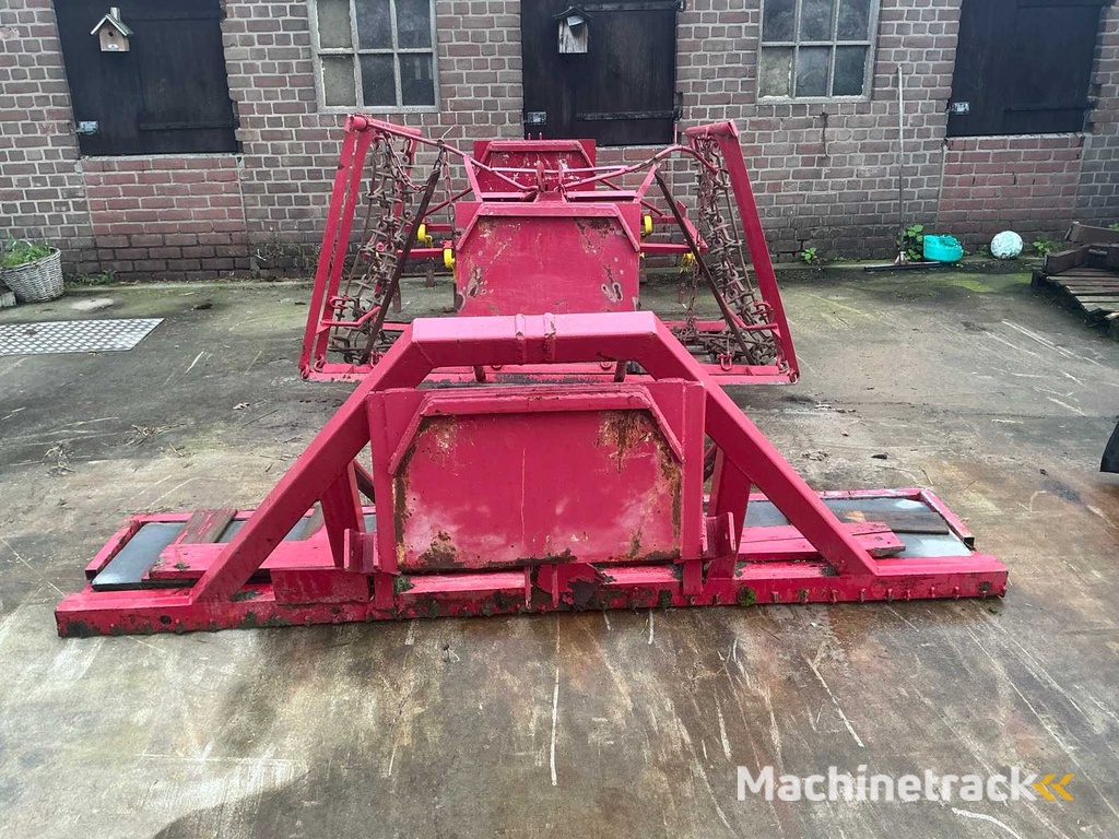 Slide, meadow drag and 9-tooth cultivator