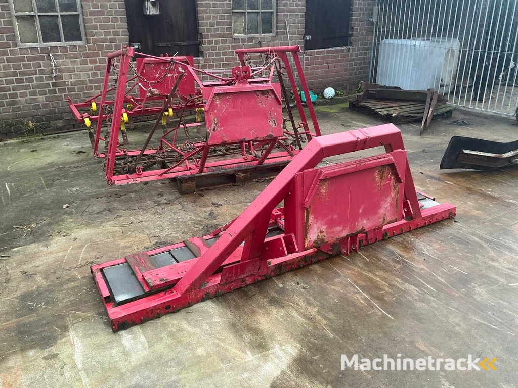 Slide, meadow drag and 9-tooth cultivator