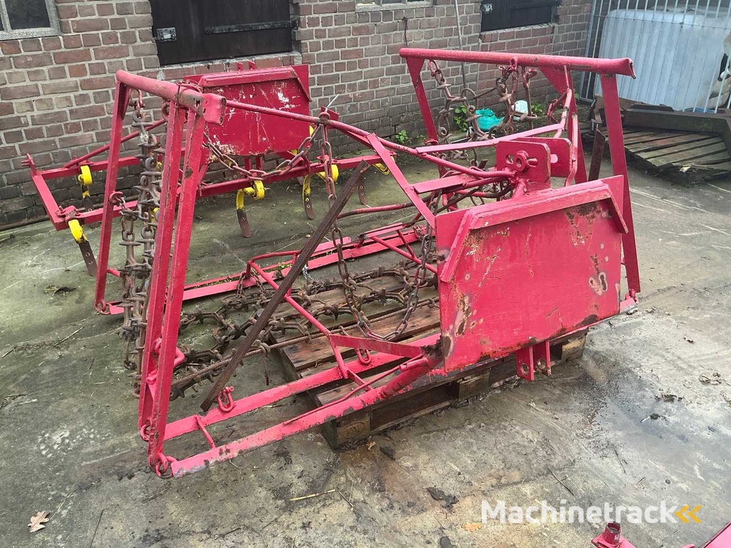 Slide, meadow drag and 9-tooth cultivator