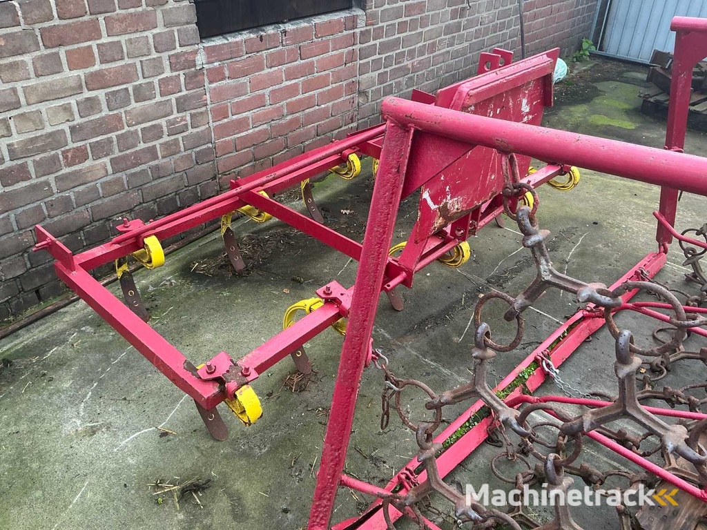 Slide, meadow drag and 9-tooth cultivator