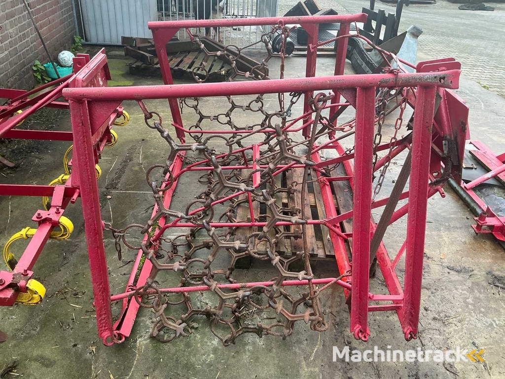 Slide, meadow drag and 9-tooth cultivator