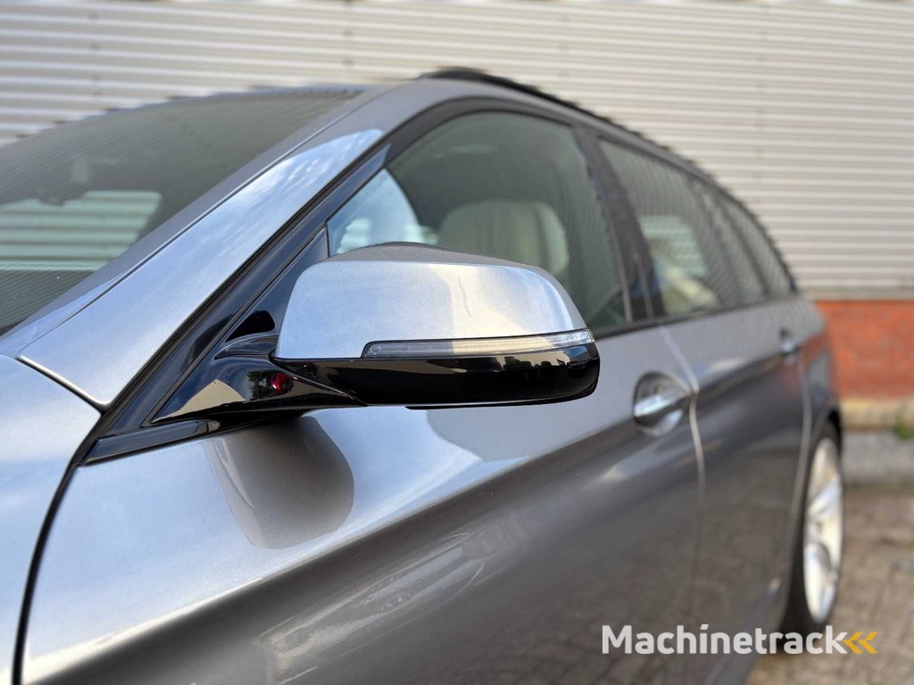 BMW 520i Touring High Executive Automaat; HV-545-J