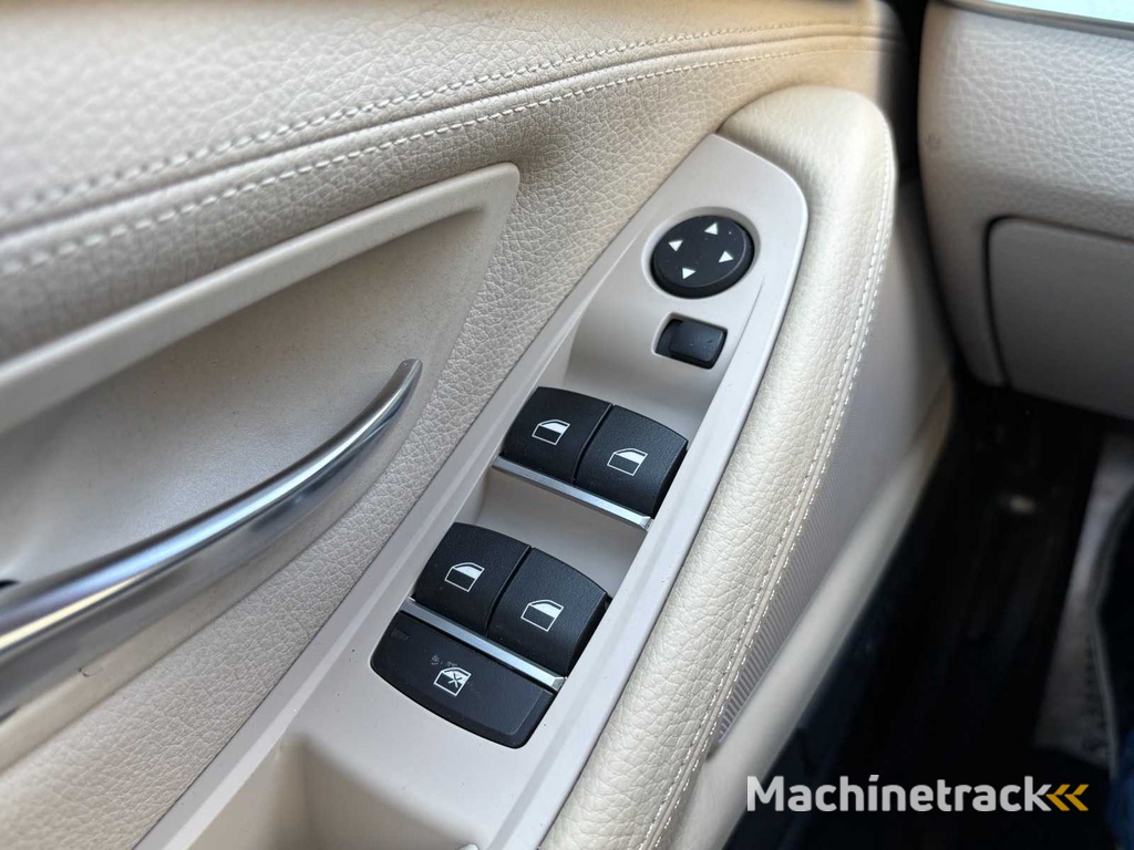 BMW 520i Touring High Executive Automaat; HV-545-J