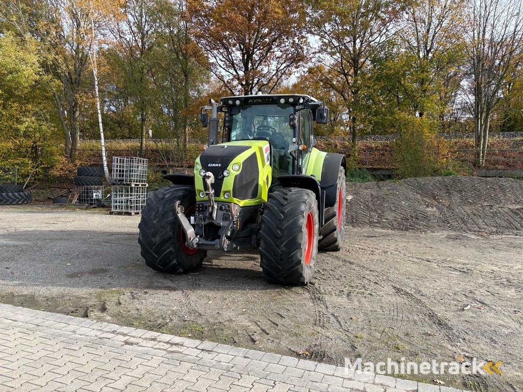 CLAAS ARION 850 C-MATIC farm tractor with all-wheel drive