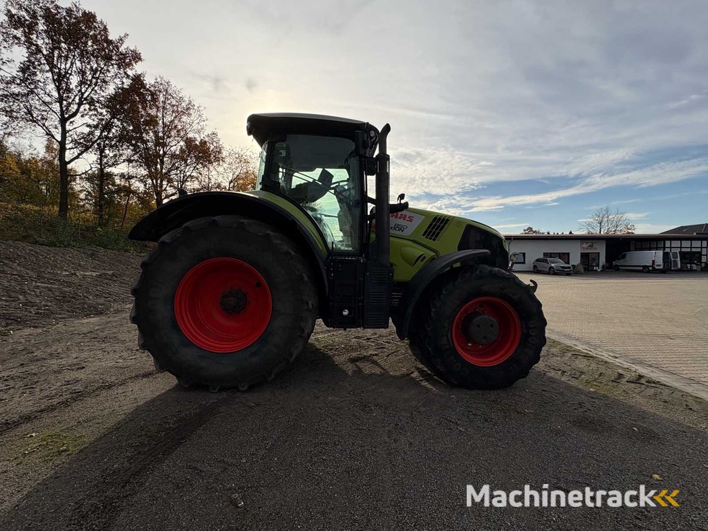 CLAAS ARION 850 C-MATIC farm tractor with all-wheel drive