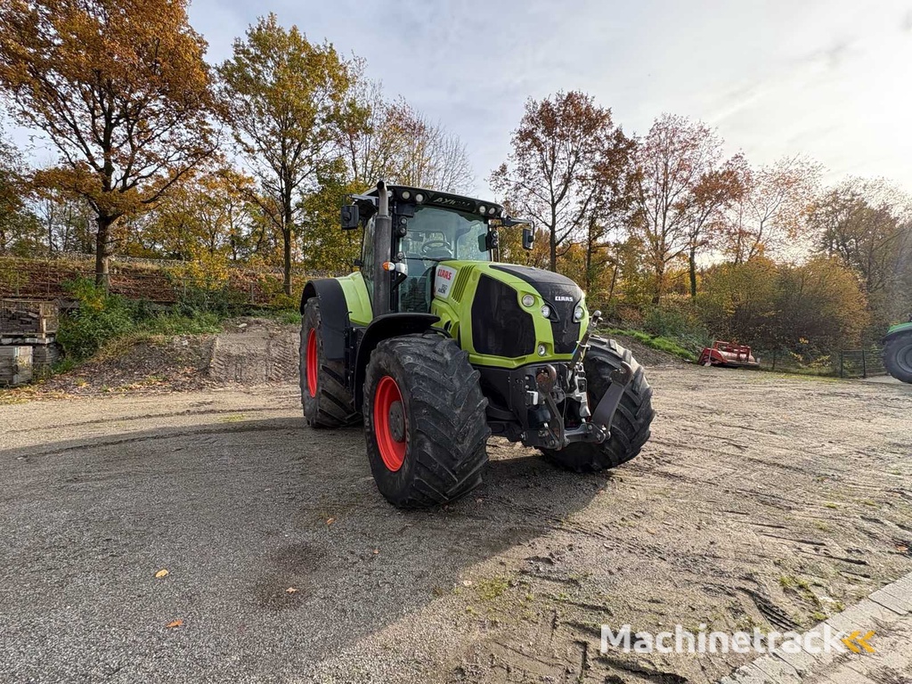 CLAAS ARION 850 C-MATIC farm tractor with all-wheel drive