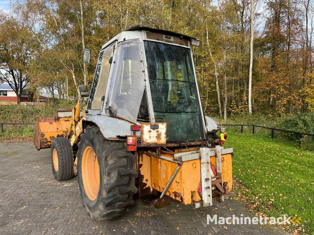 Case - 1995 - 580 SK Turbo - Graaflaadmachine