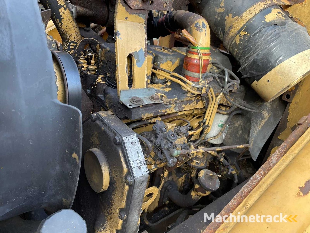 Case - 1995 - 580 SK Turbo - Graaflaadmachine