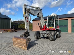 2015-takeuchi-tb295w-mobilbagger