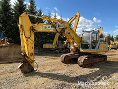 new-holland-kobelco---e-215b---rupsgraafmachine---2007