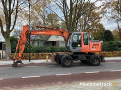 hitachi---2008---zx130w---banden-graafmachine