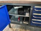 Thumbnail of Workbench with contents