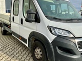 Minituur van 2023 Peugeot Boxer laadbak - 40000km - 7 pers. - trekhaak
