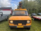 Minituur van 1980 Ford Transit 190 hoogwerker