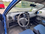 Minituur van 2003 Suzuki Ignis WTAK Personenauto