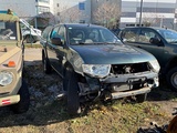 Minituur van Mitsubishi L200 Legervoertuig