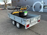 Minituur van Tandemas Aanhangwagen Met 3x Grasmaaier