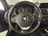 Minituur van BMW 116i Business; 69-XKJ-4