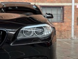 Minituur van BMW 550i 4.4 V8 High Executive M-Sport F11 408pk 2011 5-serie Touring, HP-259-J