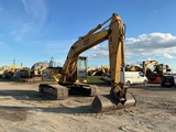 Minituur van Caterpillar - 320 L - Rupsgraafmachine - 1995