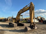Minituur van Caterpillar - 320 L - Rupsgraafmachine - 1995