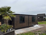 Minituur van 2025 Rhino Houses 36,5 m2 2 slaapkamers, badkamer en keuken Mobiele woonunit / Tiny house