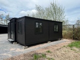Minituur van 2025 Rhino Houses 36,5 m2 2 slaapkamers, badkamer en keuken Mobiele woonunit / Tiny house