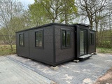 Minituur van 2025 Rhino Houses 36,5 m2 2 slaapkamers, badkamer en keuken Mobiele woonunit / Tiny house