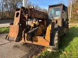 Minituur van 2000 Caterpillar TH63 verreiker