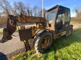 Minituur van 2000 Caterpillar TH63 verreiker